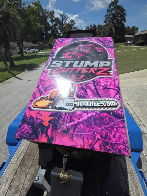 Stump CutterZ logo on top panel of 904Tree stump grinder — 904TREE.com branding
